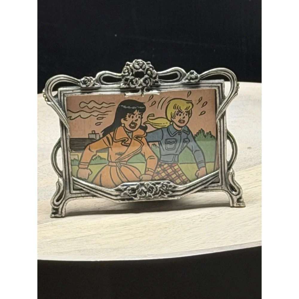 Vintage Betty & Veronica Archie comic in ordinate silver metal frame 2×3 easel